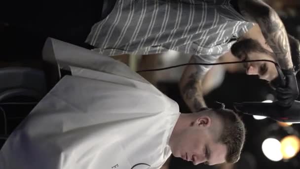 Tattooed Barberman Brushing Drying Customer Hair Stylish Haircut Using Comb — Video Stock