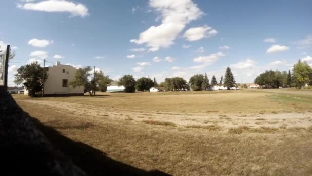 Time Lapse Sitting Wooden Fence Looking Empty Field Cut Grass — Stockvideo