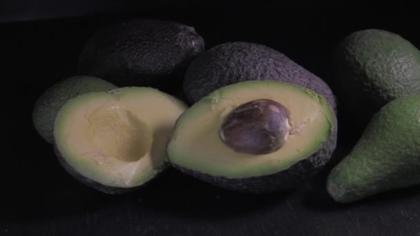 Avocadoes Black Background — Stok video