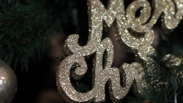 Macro Footage Christmas Decorations Glittery Merry Christmas Sign Christmas Tree — Wideo stockowe