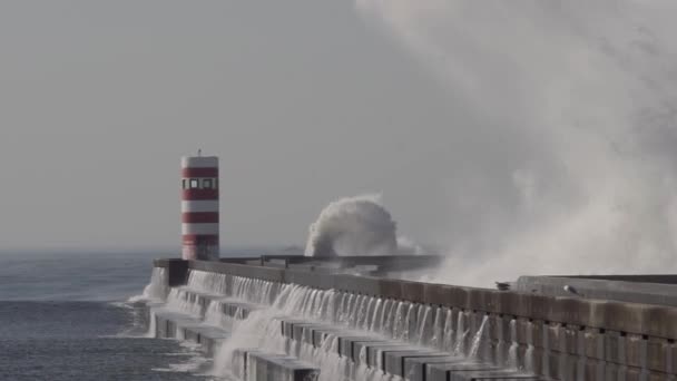 isolated lighthouse with big ocean waves crash
