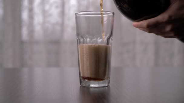 Pouring Dark Soda Tall Glass Bubbles Slow Motion Straight Ahead — Stockvideo