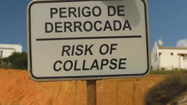 Sign Showing Dangerous Cliffs — Stockvideo