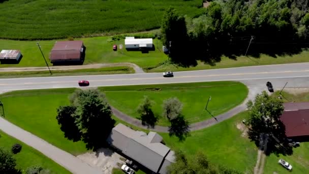 Aerial View Country Road Cars Commuting Cornfields Trees Surrounding Nice — Stockvideo