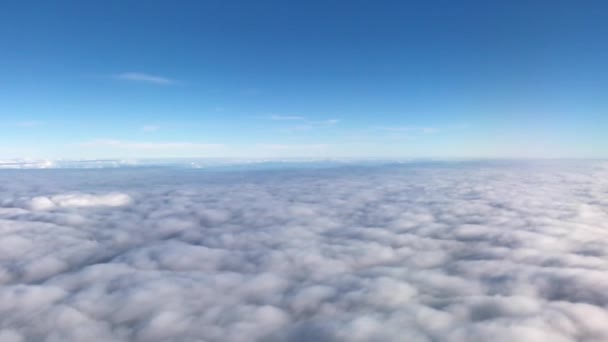 View Airplane Window Bright Fluffy Clouds Deep Blue Stratosphere — ストック動画