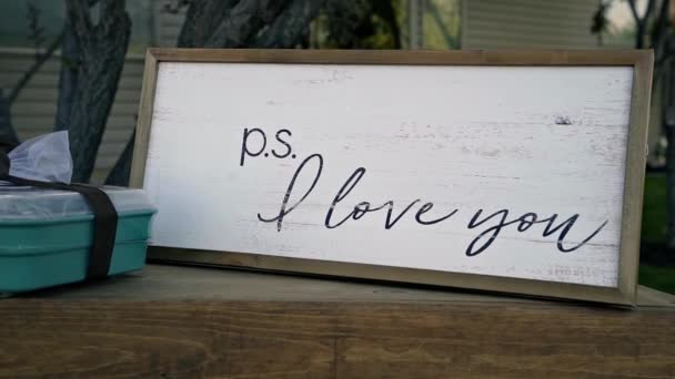 Wooden Sign Reads Love You Outdoor Summer Wedding Reception — Stockvideo