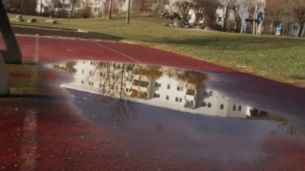 Sunny Puddle Reflection Residential Building Berlin Germany — Stockvideo