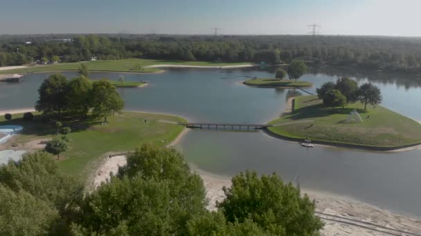 View Recreational Swimming Lake Netherlands Showing Islands Green Fields Beaches — стоковое видео