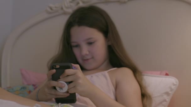 Middle School Girl Her Iphone Her Bedroom Smiles Her Phone — Stockvideo