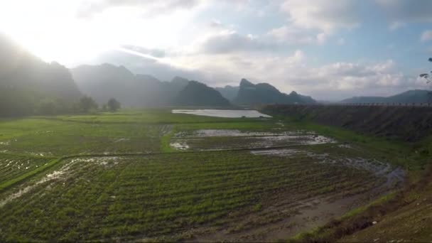 Vietnam Rice Patties Suround Mountains Sunset Pan Shot Gopro — Vídeo de Stock