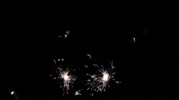 Two Random Moving Sparking Sparklers Dark Room — Stock Video
