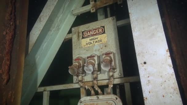 High Voltage Sign Flooded Nuclear Silo — Stockvideo