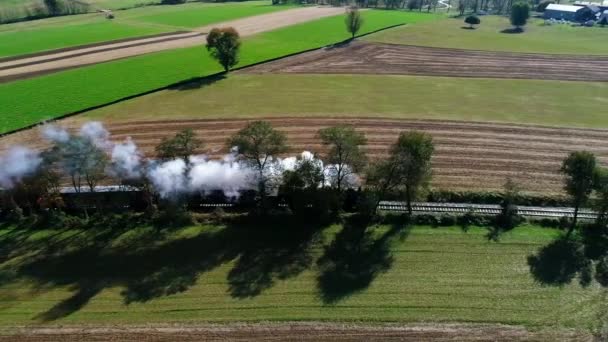 Steam Passenger Train Puffing Smoke Amish Countryside Seen Drone — Stock video