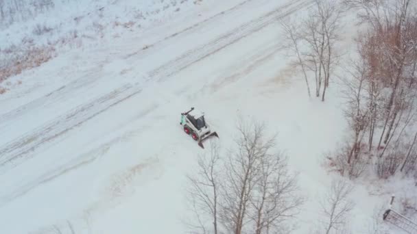 Clearing Snow Rural Property Wheeled Bobcat — Stock videók