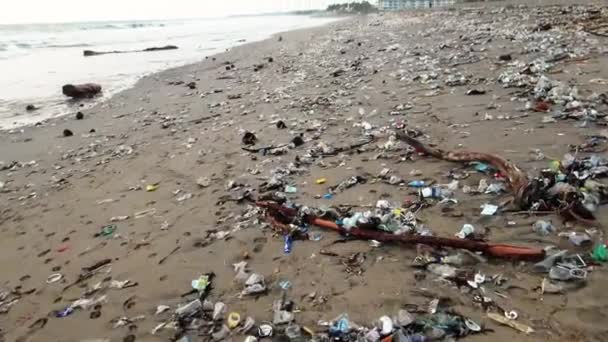 Camera Moves Fast Plastic Trash Beach Polluted Ocean Threatens Life — Video