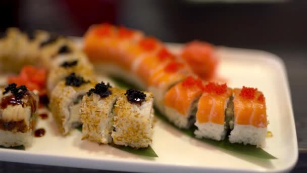 Close Video Freshly Made Different Types Uramaki Sushi Plate Ginger — Vídeo de Stock