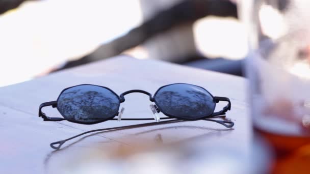 Closeup Sunglasses Table — 图库视频影像