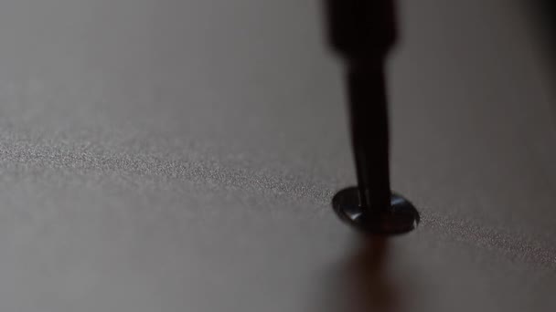 Macro View Screw Being Removed Notebook — Stock video