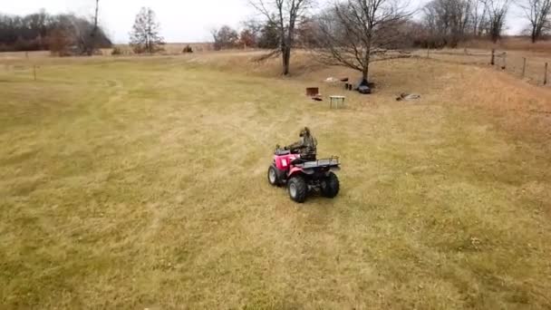 Person Driving Four Wheeler Flying Forest Lake — Vídeo de Stock