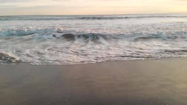 Drone Flying Forwards Upwards Waves Breaking Beach Sunset — Stockvideo