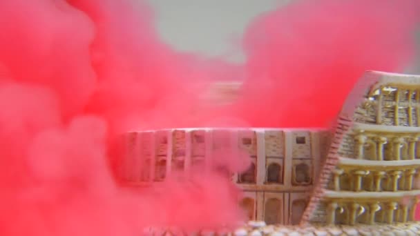 Slow Motion Close Colosseum Underwater Red Water Ink Swirling — Vídeo de stock