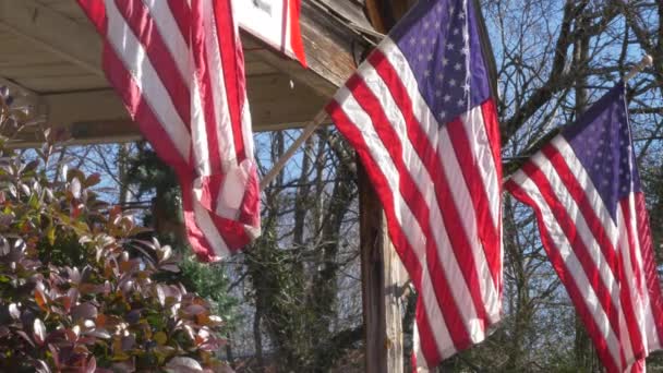 American Flags Hanging Porch Old House — Vídeo de stock