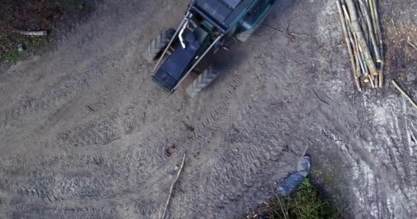 Top Aerial View Agricultural Tractor Towing Logging Trailer Entering Frame — Vídeo de stock
