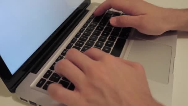 Male Hands Typing Laptop Computer Keyboard Blank White Screen Medium — Stock video