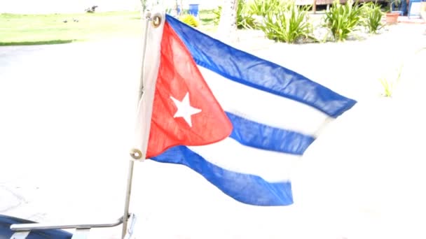 Cuban Flag Waving Wind Placed Back Bike Gardens Beach Background — Stockvideo