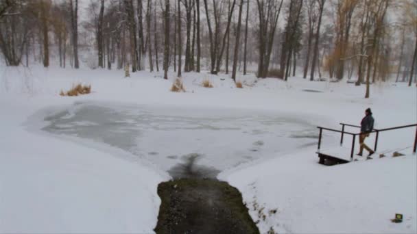 Man Strolling Snowy Park Heavy Snow Fall Stops Small Frozen — Video Stock