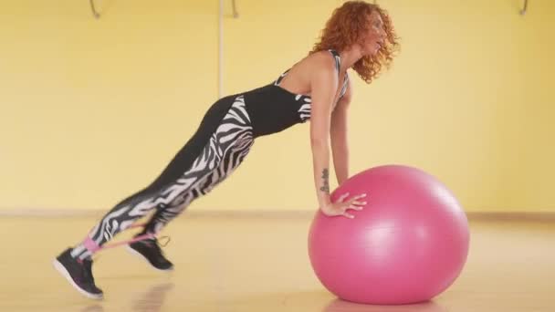 Girl Red Curly Hair Sport Hall She Doing Exercises Legs — Stock Video