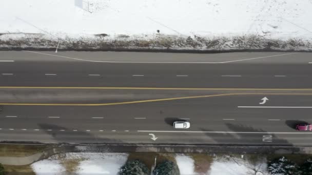 Aerial View Follows Cars Snow Day — Stockvideo