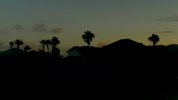 Sunset Texas Coast Silhouetted Houses Trees — Stock Video