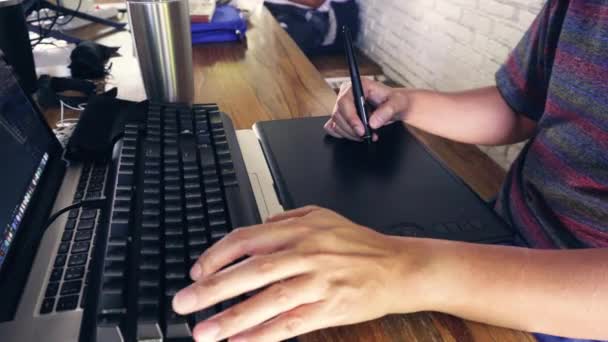 Man Graphic Designer Working Using His Laptop Keyboard Tablet — Stok video