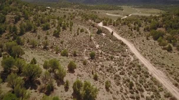 Aerial Dirt Road Butte Mesa Flat Top Mountain Beautiful Day — Stock video