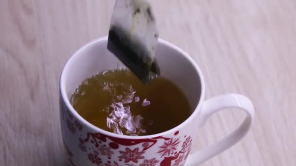 Teebeutel Wasser Tauchen — Stockvideo