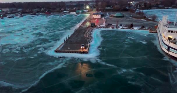 Pickup Truck Sitting End Dock Headlights Reflecting Frozen Lake Winter — Stock Video