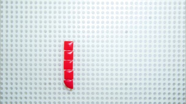 Зупинити Рух Літери Створюючи Один Піксель Час Зроблений Дитячими Іграшками — стокове відео