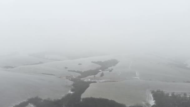 Aerial Forward Snow Covered Frame Filling Hill Snow Storm — Wideo stockowe