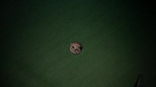 Wide Shot Purple Mini Golf Ball Going Hole — Stock Video