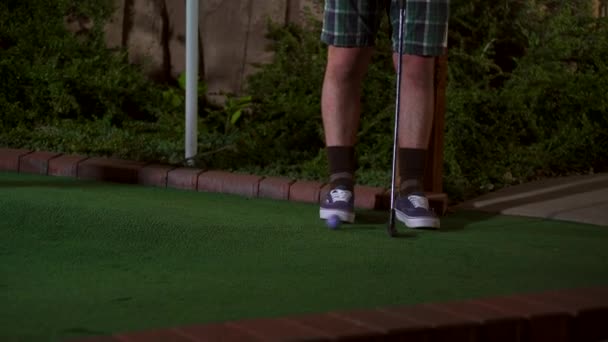 Close Purple Mini Golf Ball Getting Hit Club Shot Horrible — Stock Video