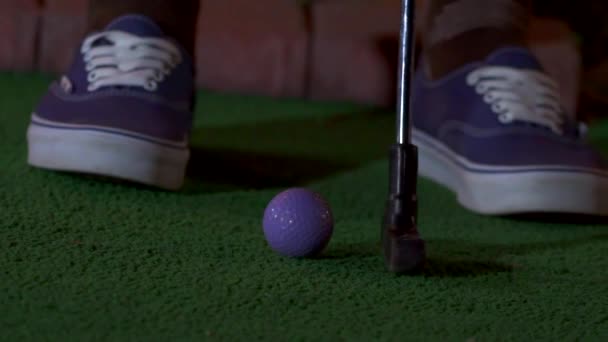 Slow Motion Close Purple Mini Golf Ball Getting Hit Club — Stock Video