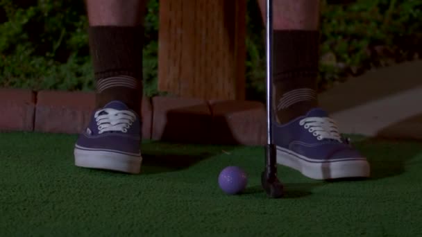 Close Purple Mini Golf Ball Getting Hit Club — Stock Video