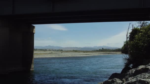 River Flowing Bridge New Zealand — Stock Video