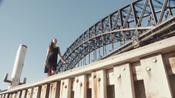 Beautiful Elegant Woman Walking Wooden Pier Sydney Harbour Bridge Background — стокове відео