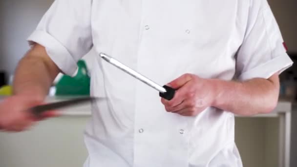 Professional Male Chef Sharpening Knife Steel His Chef Whites Ready — Stok video