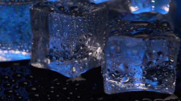 Close Ice Cubes Rotating Black Background — Stockvideo