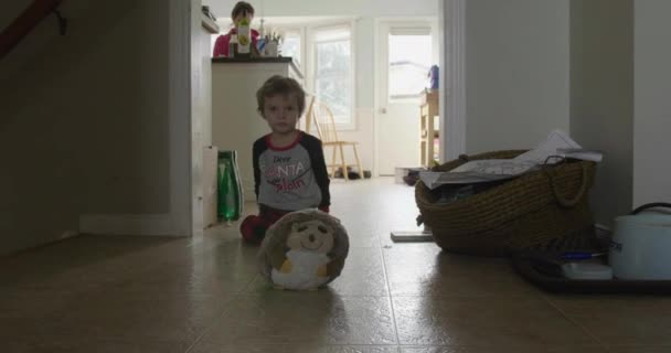 Kid Playing Stuff Toy Mom Working Background — стоковое видео