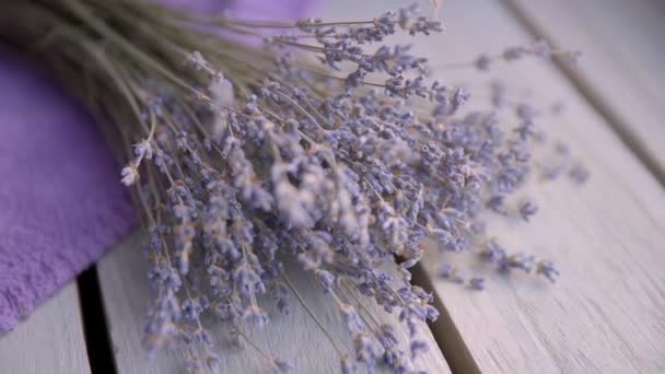 Female Hand Puts Bouquet Lavender Wooden Table — Wideo stockowe