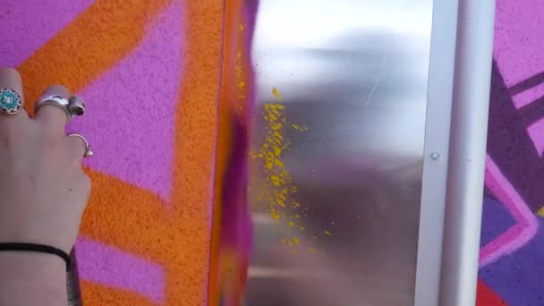 Female Muralist Painting Colorful Graffiti Building — Vídeo de stock